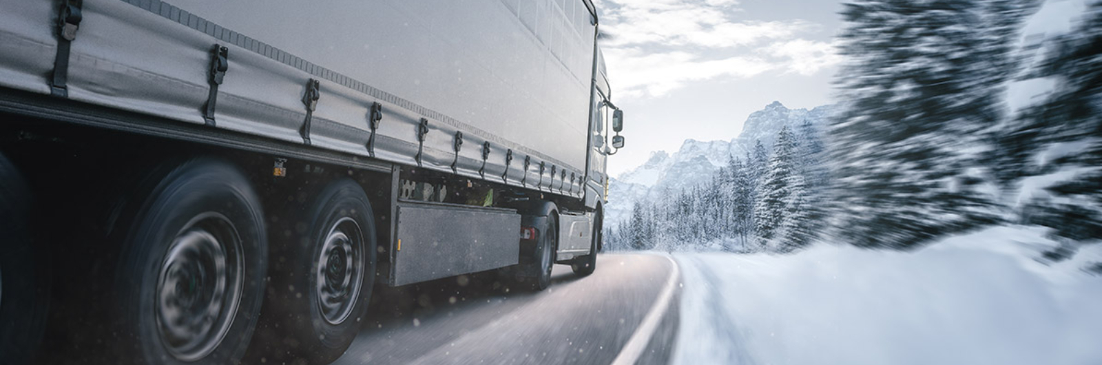 Truck in snowy landscape