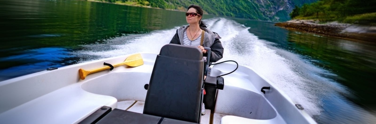 woman riding a boat