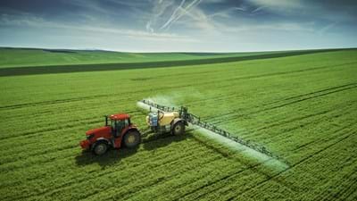 Tractor Spraying Crops